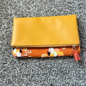 Brand new Rachel Palley fold over clutch. Orange floral pattern. Great for Fall!
